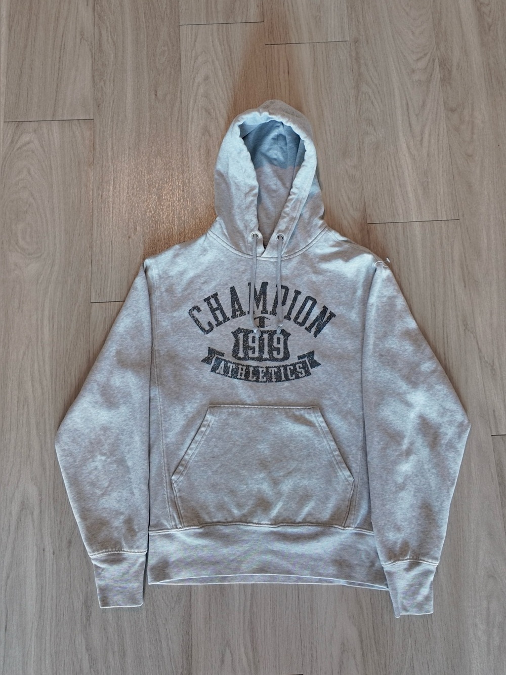 Champion Light Gray Hoodie with Black Chest Logo